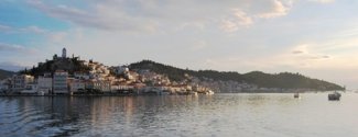 The Poros waterfront viewed from Galatas on the Peloponnese coast