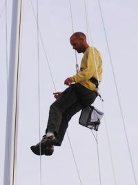 Andreas Kouvaras show's how it's really done, by checking the rigging on a Greek Sails yacht