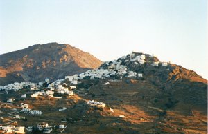 Chora on the island of Serifos in the Cyclades island as the sun sets and the evening lights come on