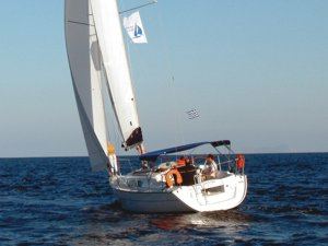 A Greek Sails Jeanneau Sun Odyssey 32i sailing yacht ‘goose winging’ during a flotilla sailing holiday